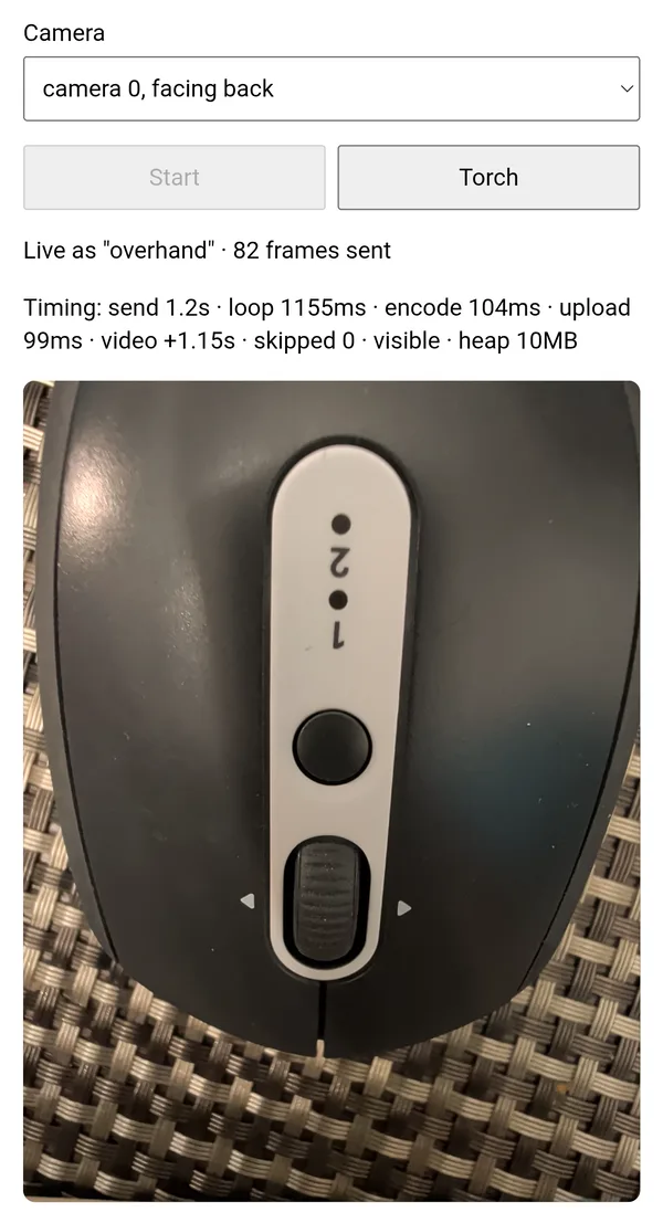 An earlier build of the Multicam phone page, connected as the camera named overhand, previewing a computer mouse